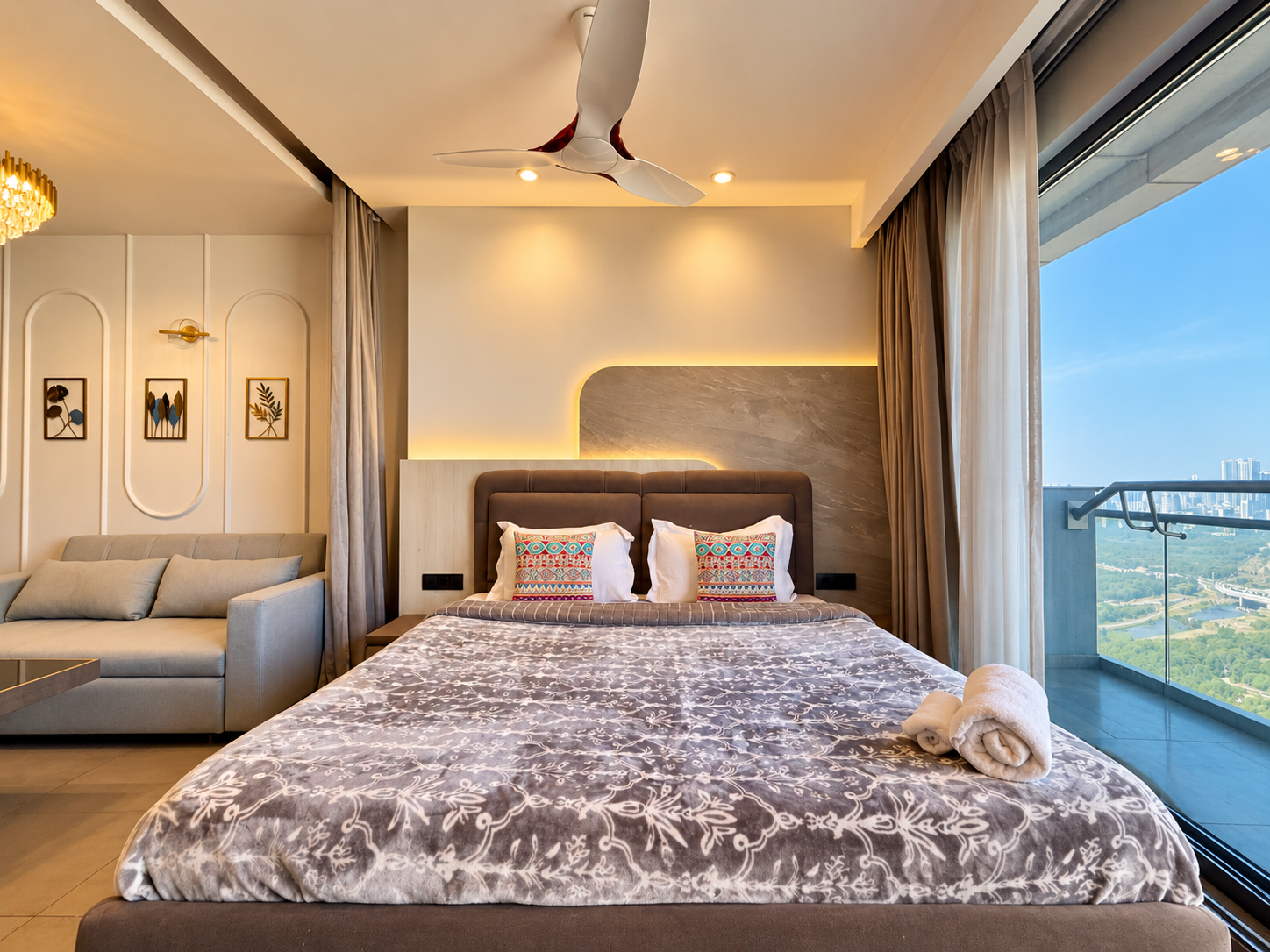 Bedroom with balcony glass door and skyline view at Panorama Balcony 32, a room in Supernova Noida