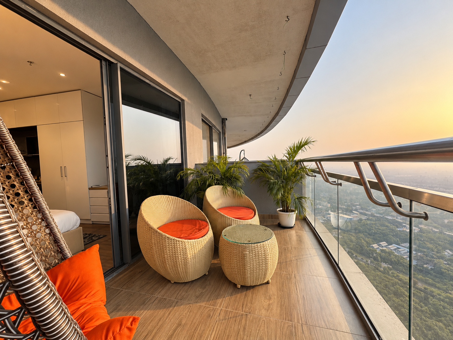 Balcony seating with city view at RiverCrest 39, Supernova room booking direct