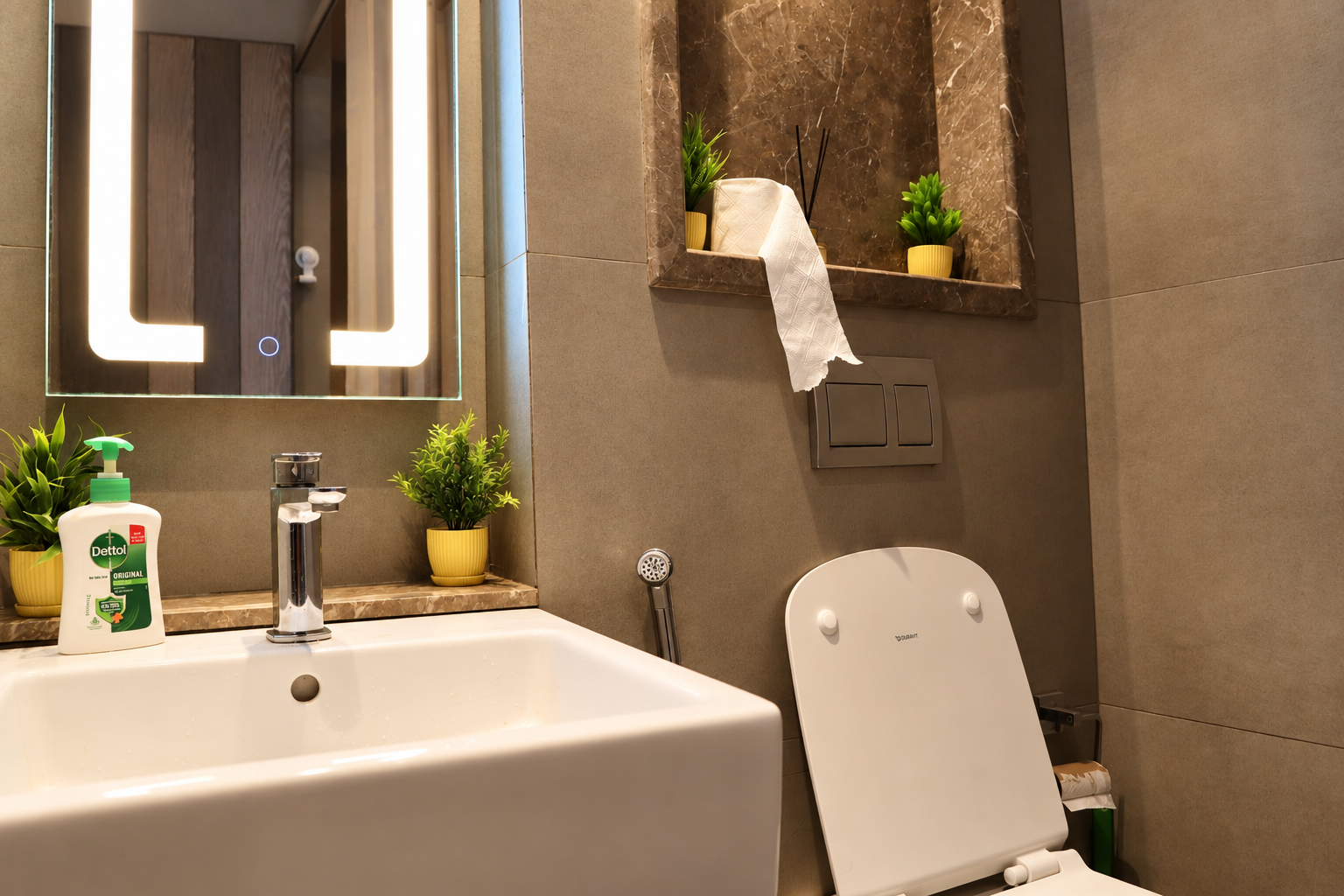 Hotel-style bathroom with LED mirror and sink at RiverCrest 39, Supernova Noida