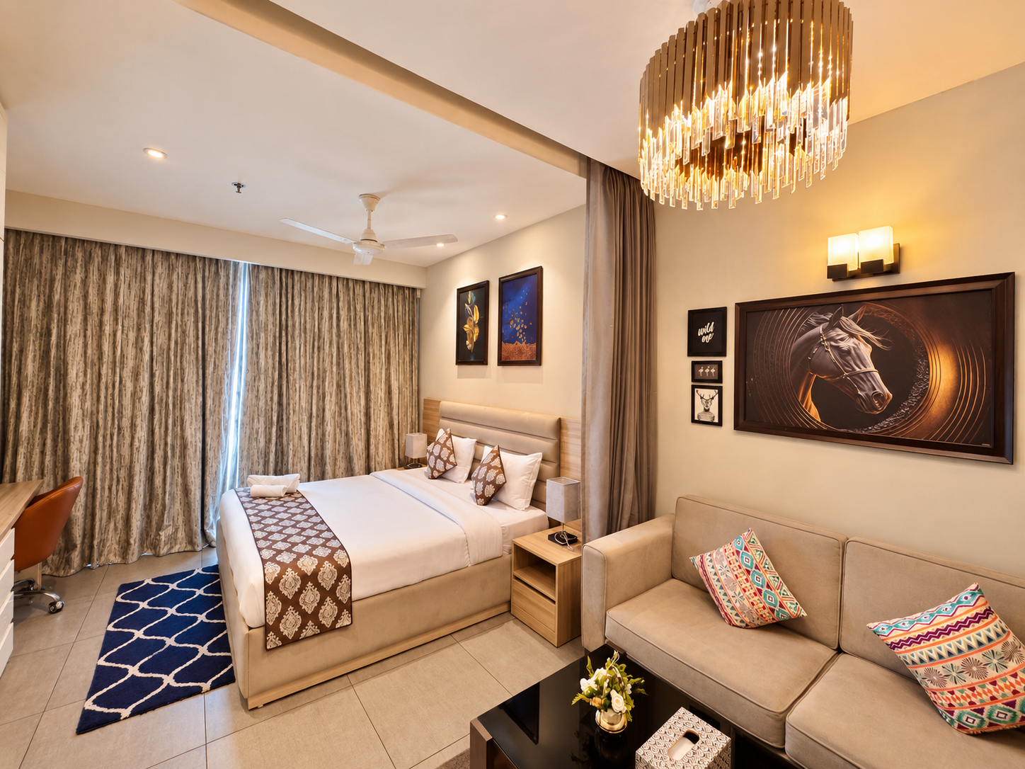 RiverCrest 39 high-floor service apartment in Noida, bedroom and living area with river view, Supernova Spira Sector 94