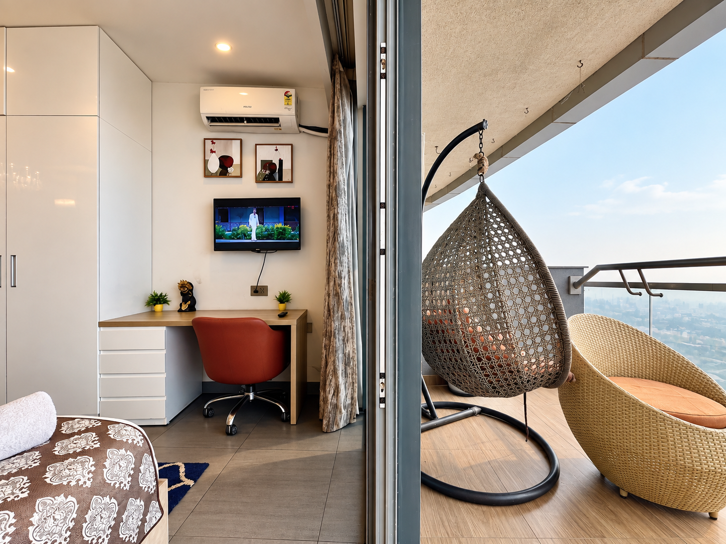 Work desk with balcony swing chairs and view at RiverCrest 39, room in Supernova Spira Noida