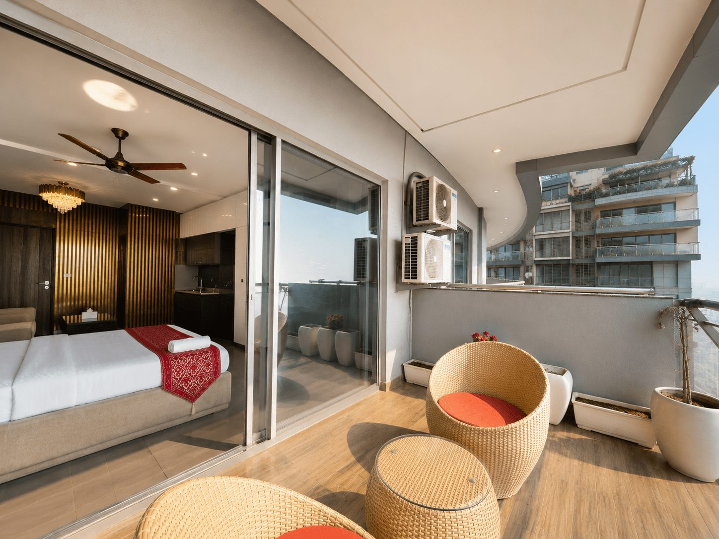 Balcony seating over the Yamuna at UrbanAura Studio 37, floor 37 of Supernova Spira, Noida