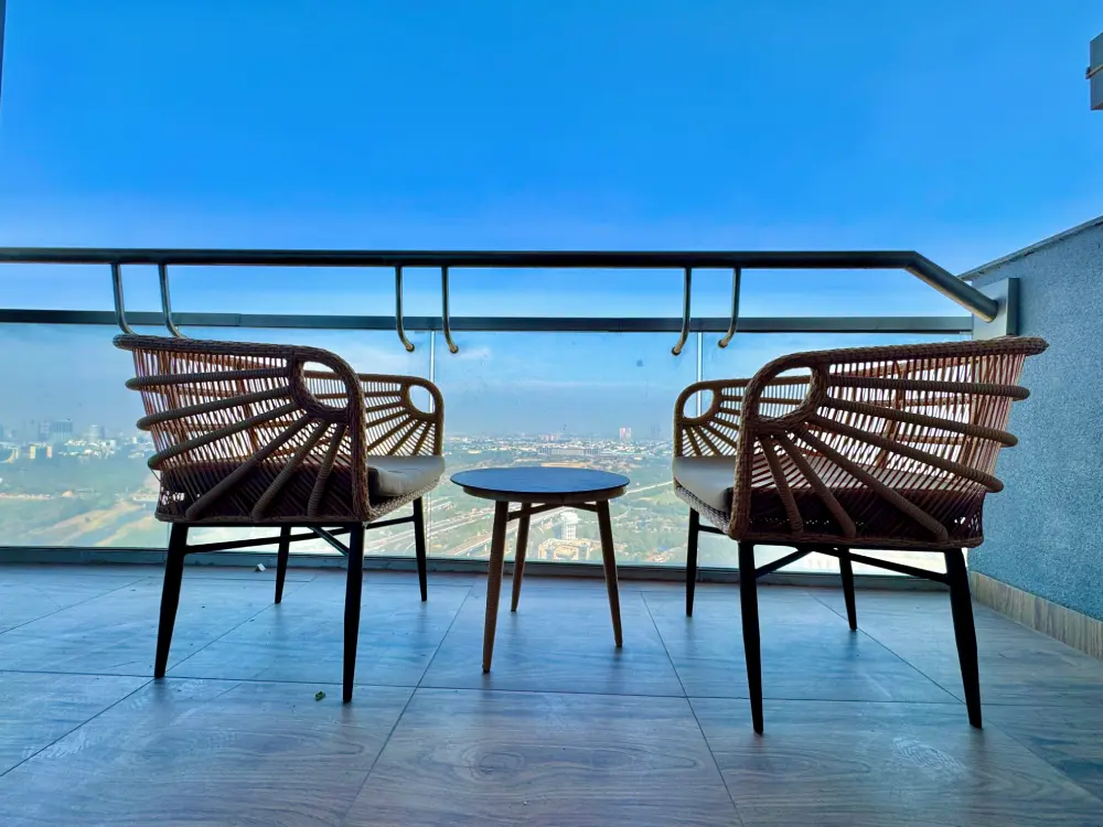 balcony hanging chair with river view at Panorama 32 Mulberry Homes Noida