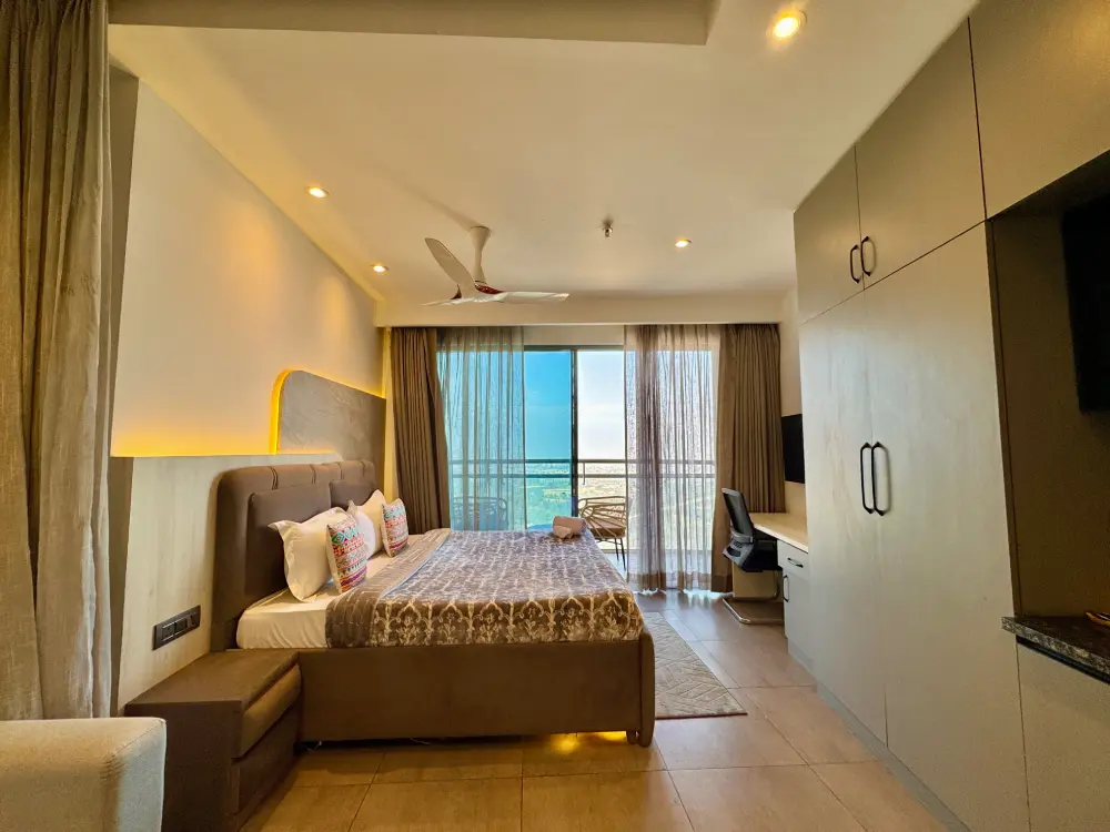 spacious bedroom interior at Panorama 32 Mulberry Homes Noida
