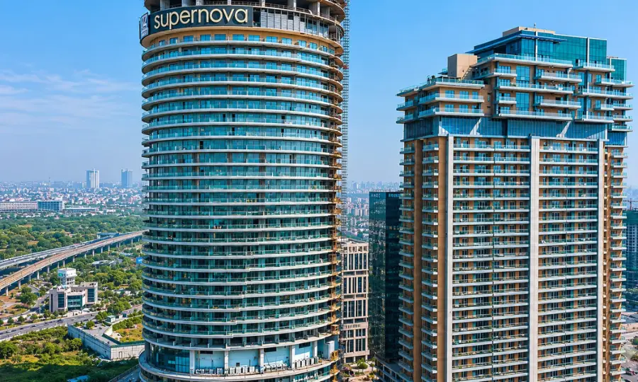 Supernova Spira luxury tower exterior with Noida Expressway and city skyline view from Sector 94