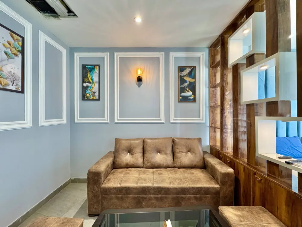 Living room with wall artwork at Mulberry Homes Supernova Spira Noida