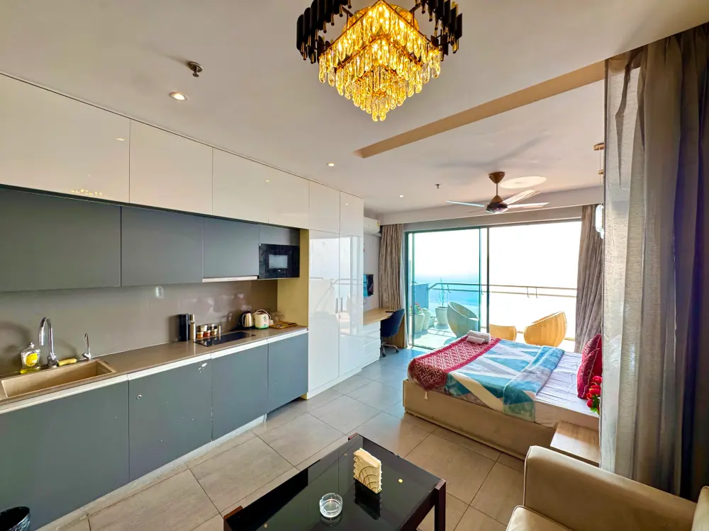 Living room with window view at Mulberry Homes Supernova Noida