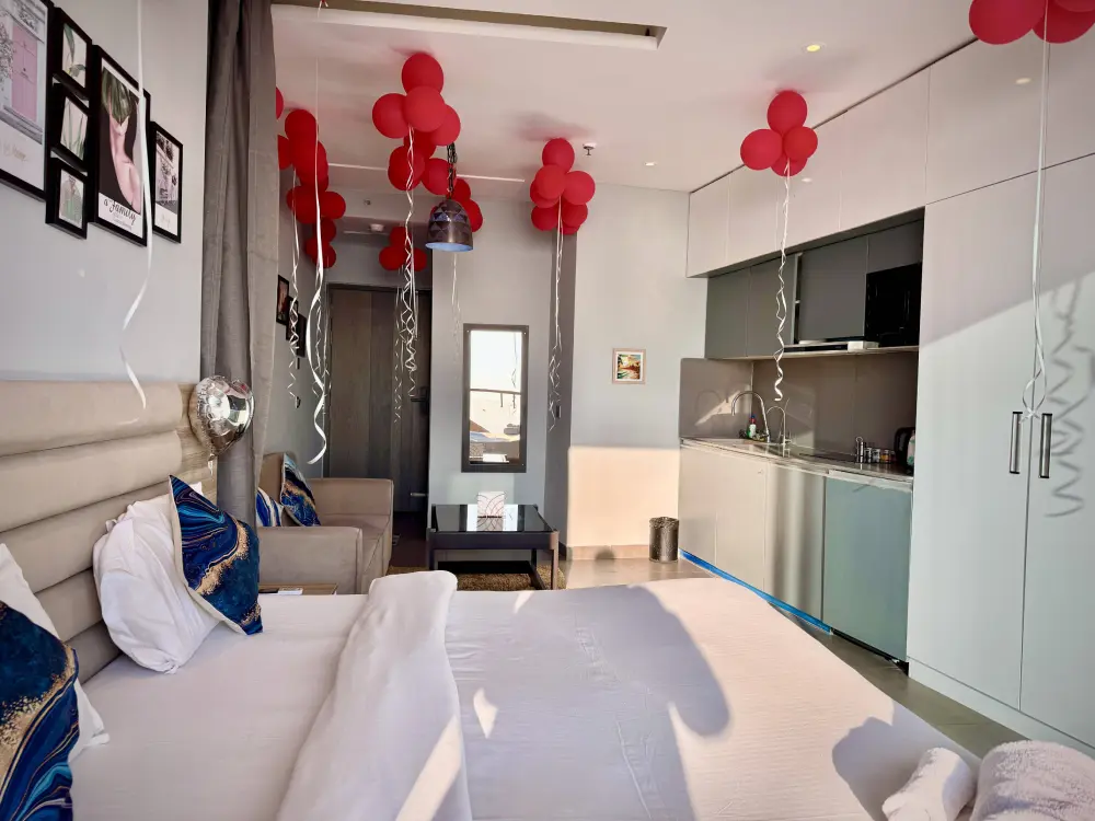 Supernova Sector 94 Noida room with red balloon decoration