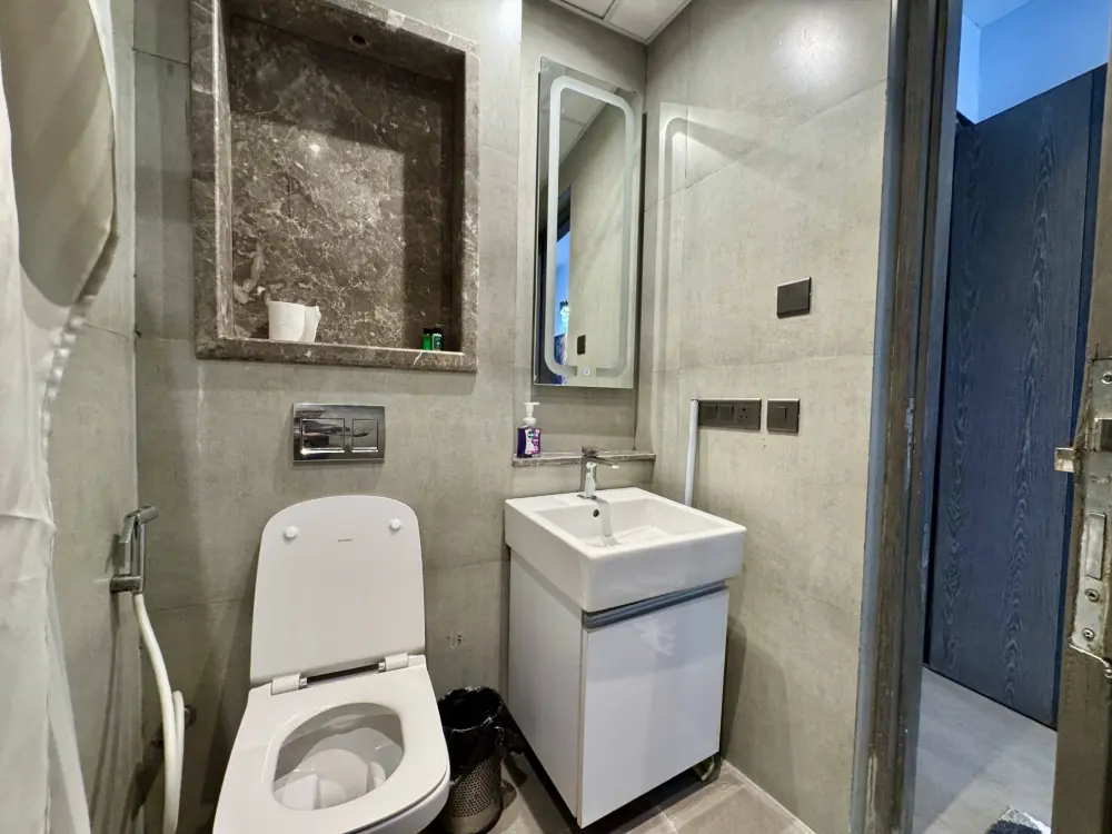 bathroom in CityGlow 28 river and city view apartment Supernova Noida