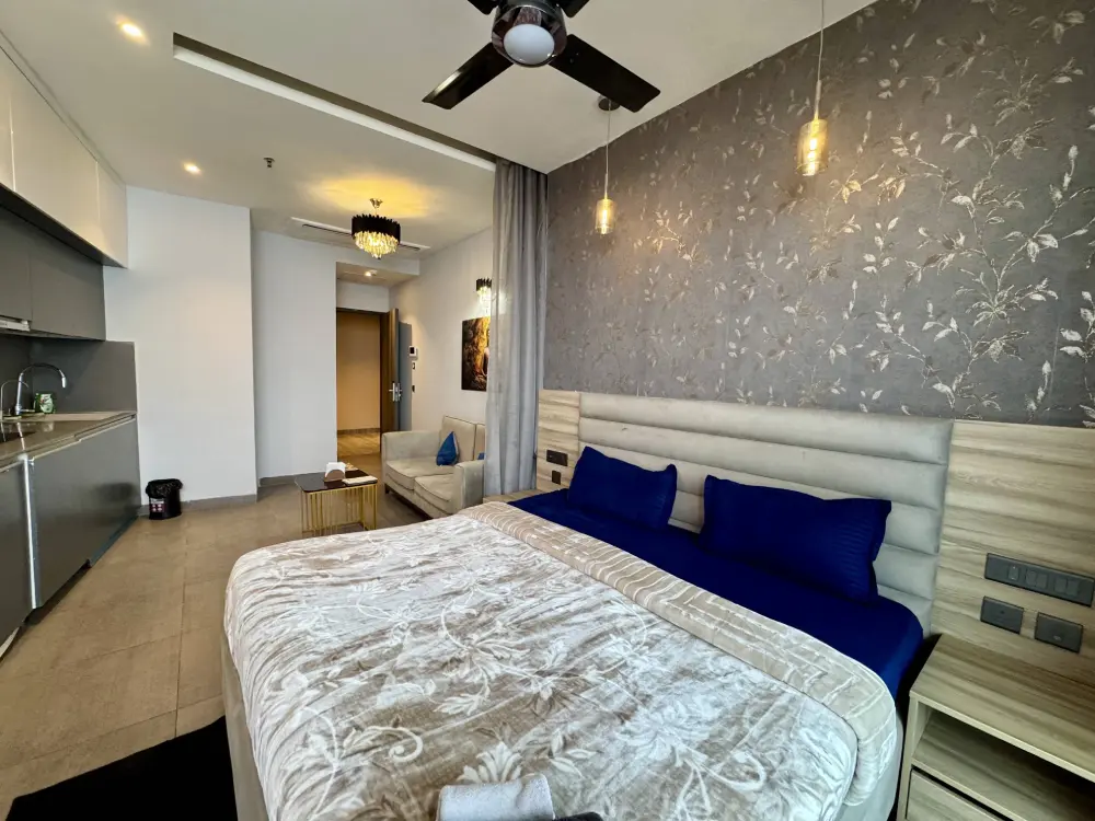 bedroom with ceiling fan in CityGlow 28 apartment Mulberry Homes Noida