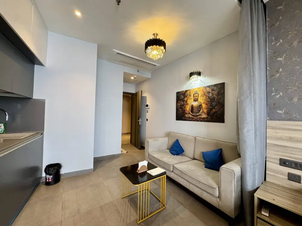 open living room with ceiling fan in CityGlow 28 Supernova Noida