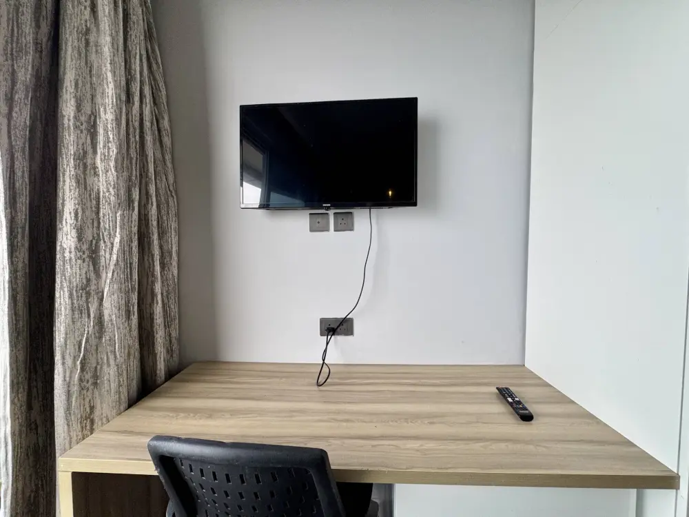 smart TV in bedroom at CityGlow 28 Supernova Spira Noida