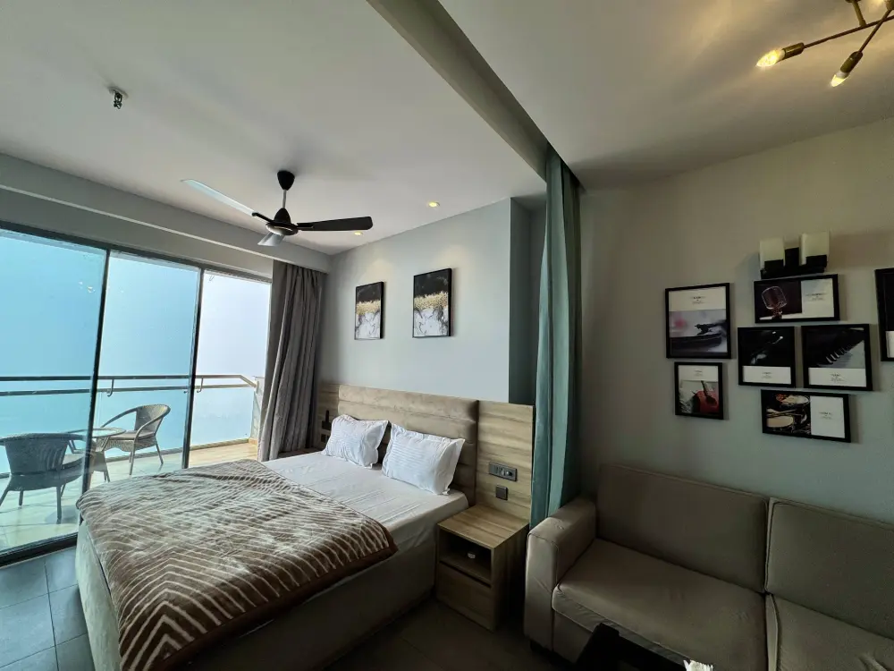 bedroom with river view window in RiverEase 29 Mulberry Homes Noida
