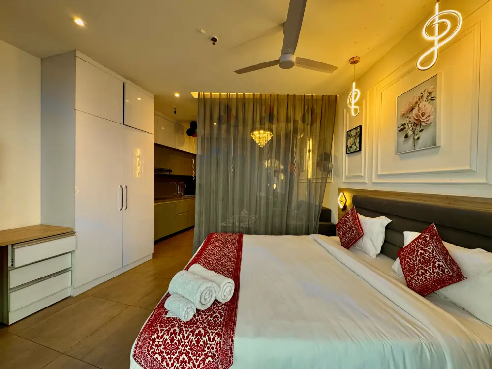 modern bedroom with smart TV in Panorama 32 Supernova Spira Noida
