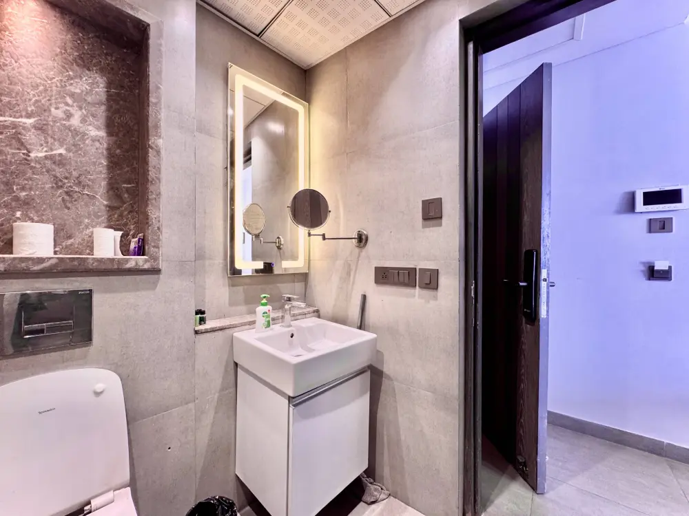 Bathroom vanity and fixtures at Mulberry Homes Supernova Spira Noida