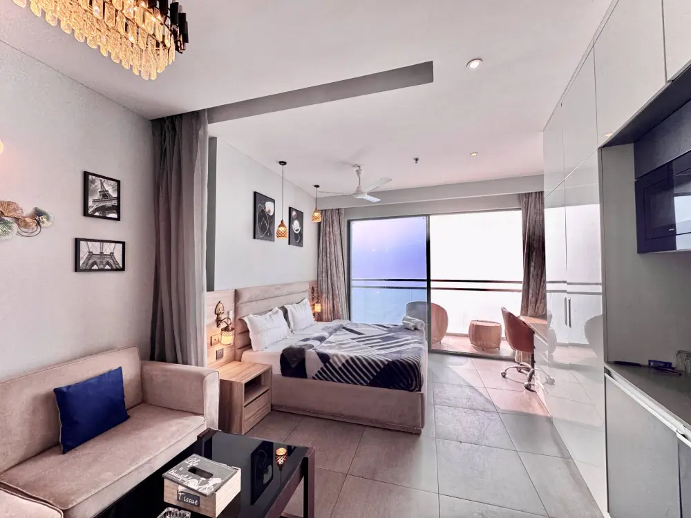 Modern living room at Mulberry Homes high-rise stay Noida