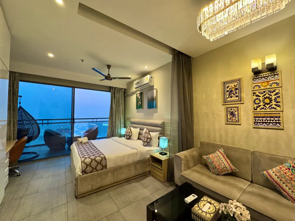 Bedroom with balcony view at Mulberry Homes Supernova Noida