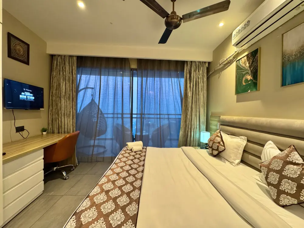 Bedroom with blue night lighting at Mulberry Homes Supernova Noida