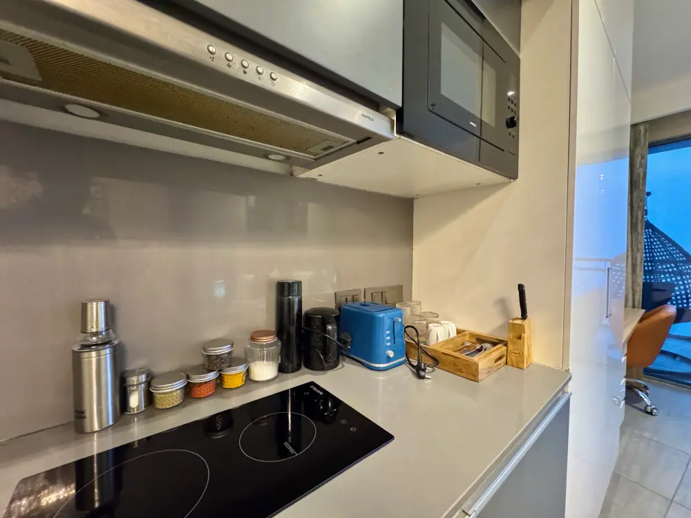 Bedroom with dark interior design at Mulberry Homes Supernova Noida