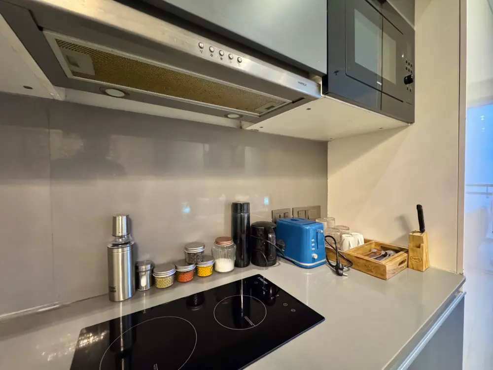 Bedroom with mirror wardrobe at Mulberry Homes Supernova Noida