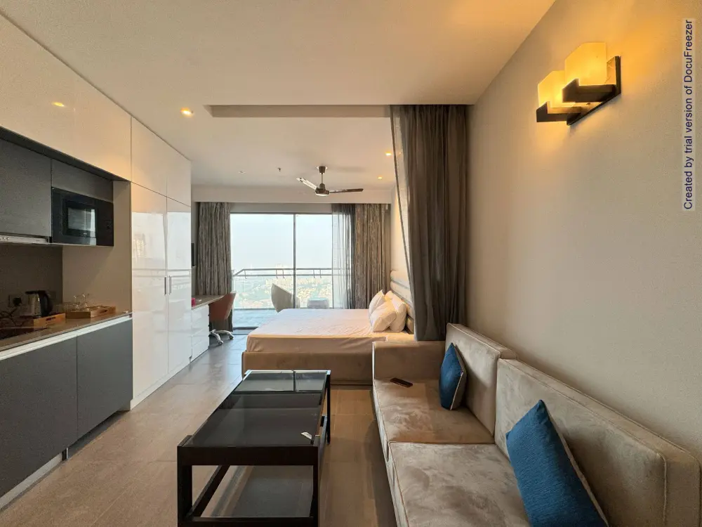 Bedroom with warm lighting at Mulberry Homes Supernova Noida