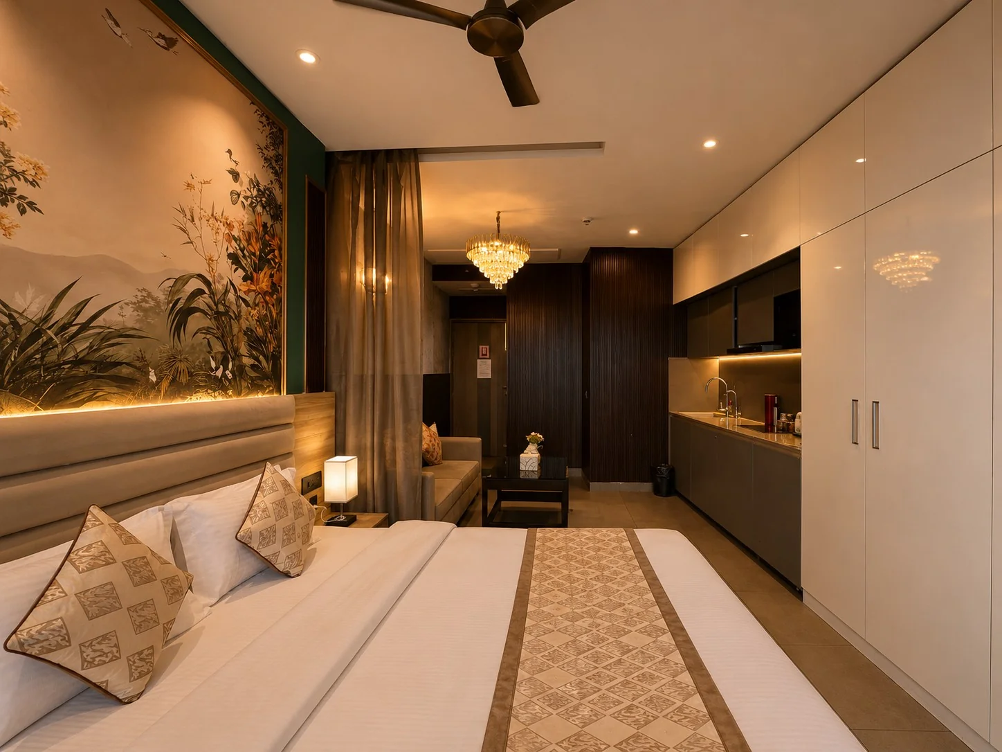 King bed with floral mural and kitchenette at SkyRiver 43, Supernova room price from ₹3,500