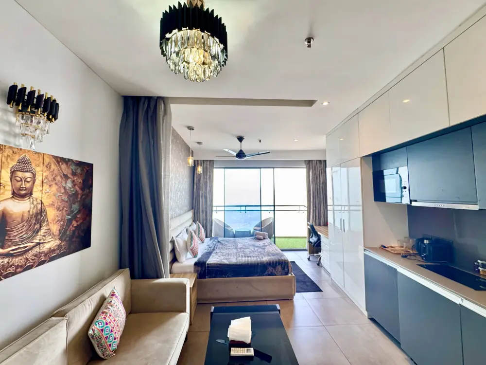 Living area with large windows at CityGlow 28 Supernova 94 Noida