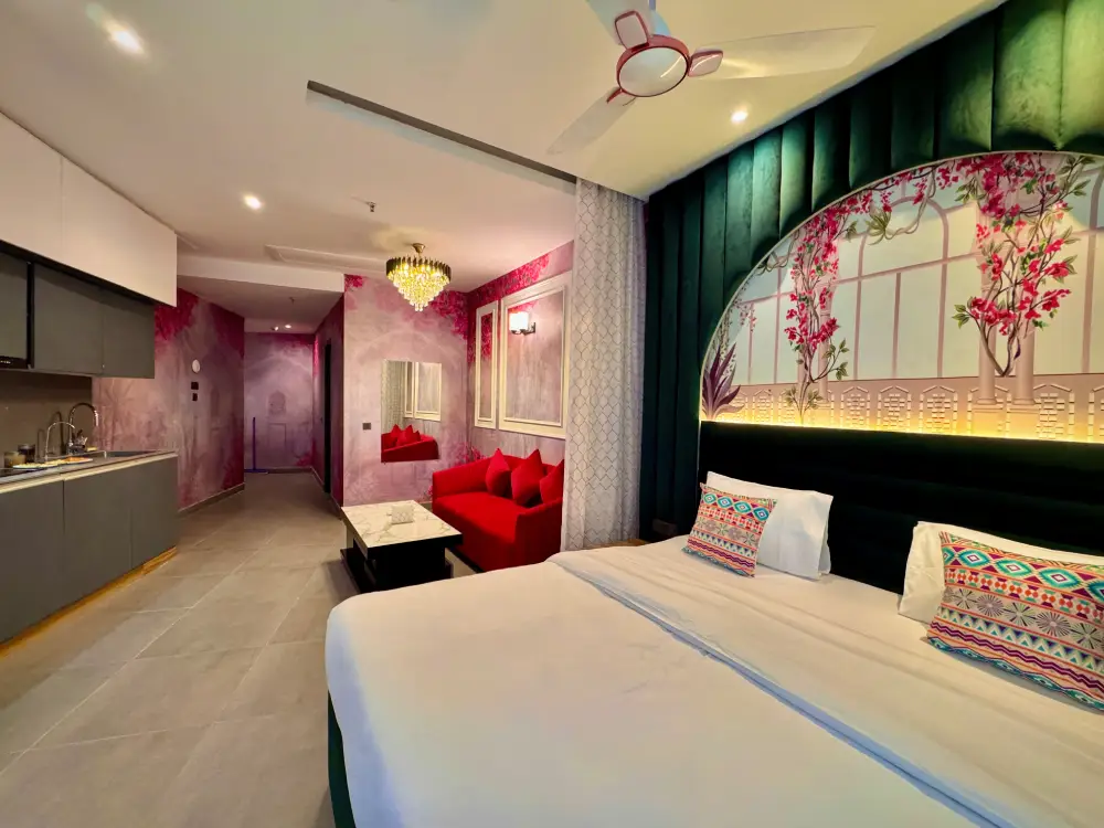 Luxury living room with TV at Spira Noida Airbnb Mulberry Homes