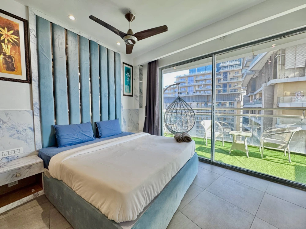 Bedroom window view in Airbnb MulberryHomes Supernova apartment Noida
