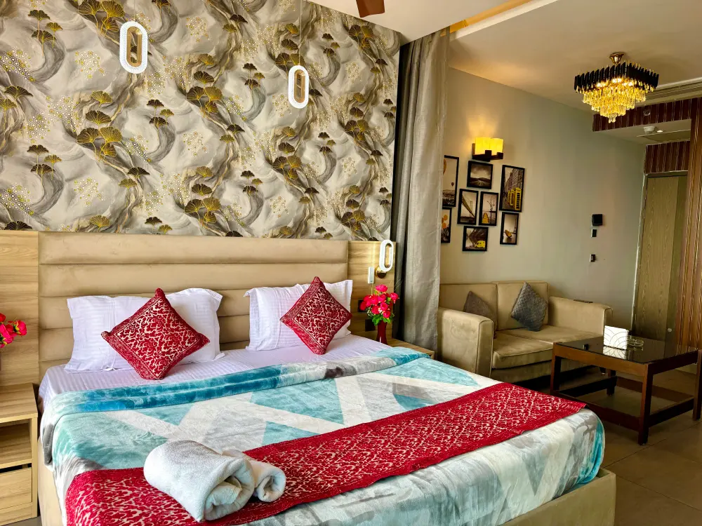 Decorative bedroom wall design in UrbanAura 37 river view apartment Noida