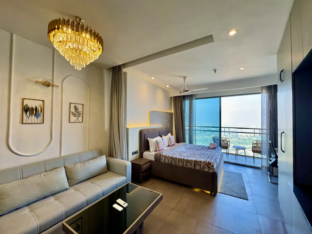 bedroom with river view on floor 32 Panorama Supernova Noida