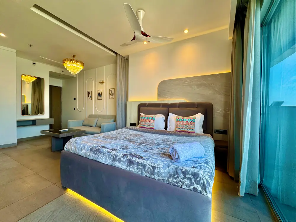 bedroom with round bed at Panorama 32 Supernova Spira Noida