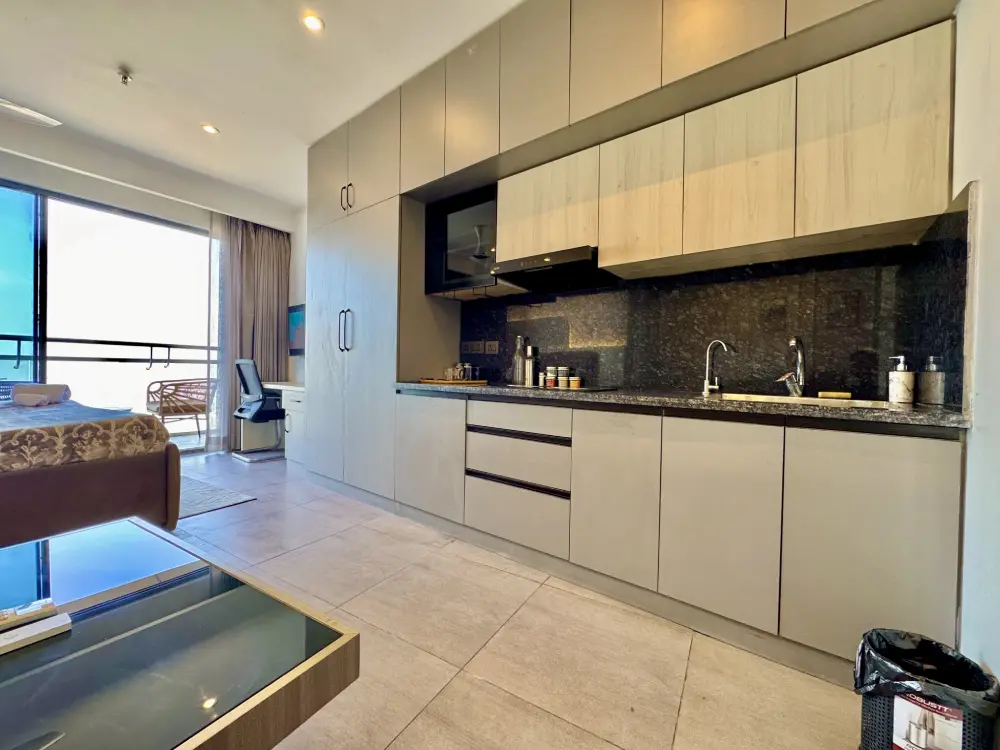 studio kitchen and bedroom at Panorama 32 Mulberry Homes Noida