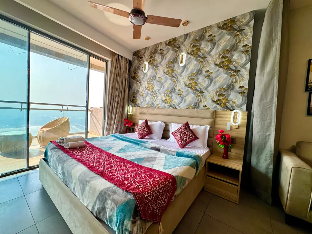 Bedroom with floral wallpaper at Mulberry Homes Supernova Spira Noida