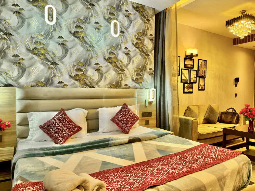 Bedroom with red bed runner at Mulberry Homes Supernova Spira Noida