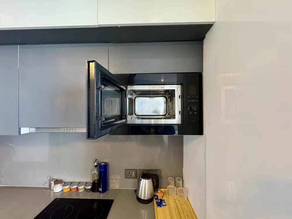 microwave and kitchen appliances at Mulberry Homes Noida