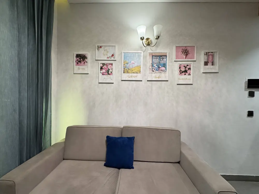 bedroom with wall art decor at Supernova Spira Mulberry Homes Noida