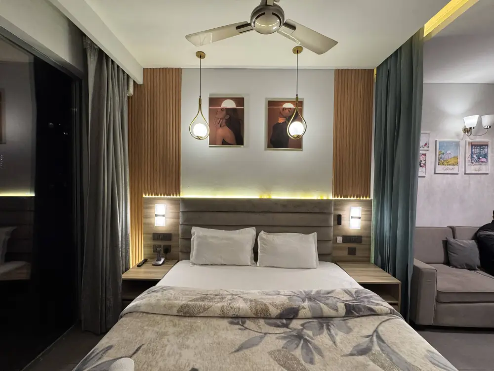 luxury bedroom with city view at Mulberry Homes Supernova Noida