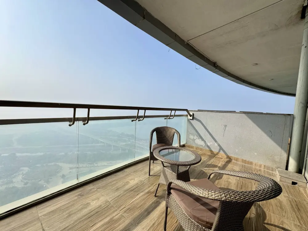 private balcony with Yamuna river view in RiverEase 29 Supernova Noida