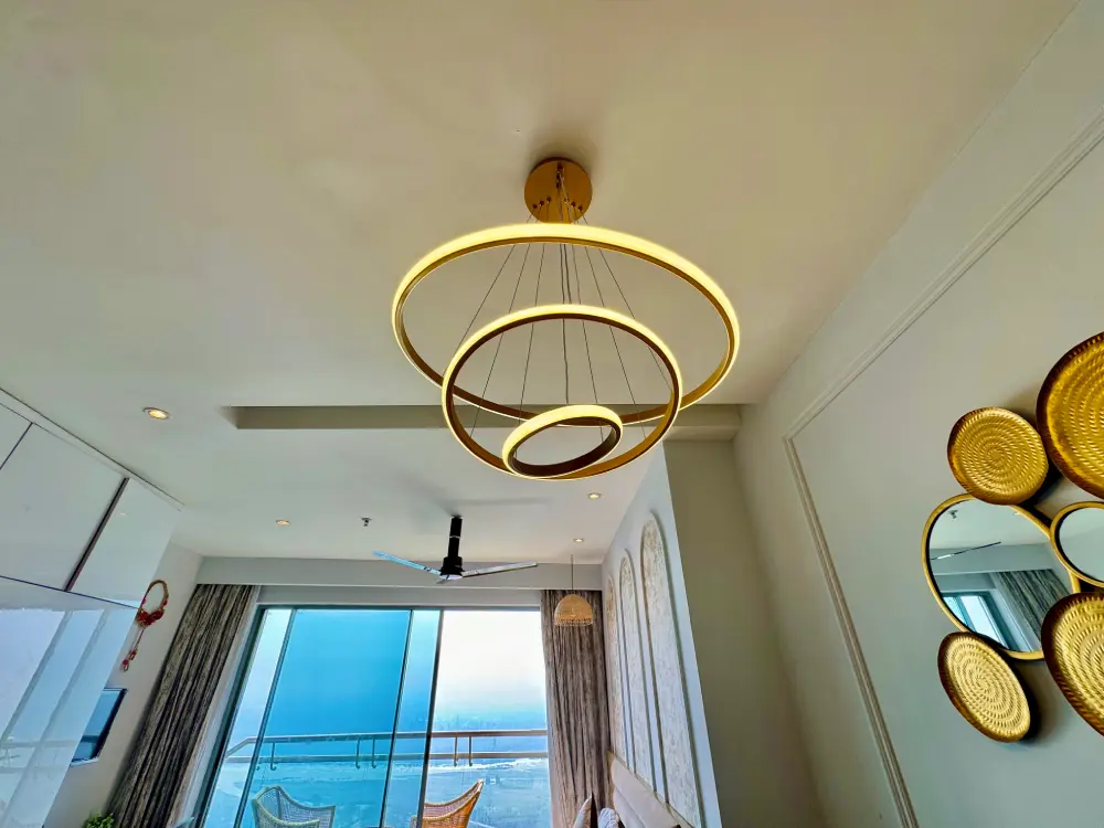 pendant light over dining area in Eleve 31 Supernova Spira Noida