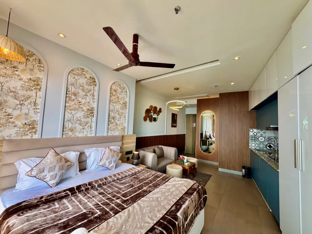spacious bedroom with wall art in Eleve 31 Mulberry Homes Noida