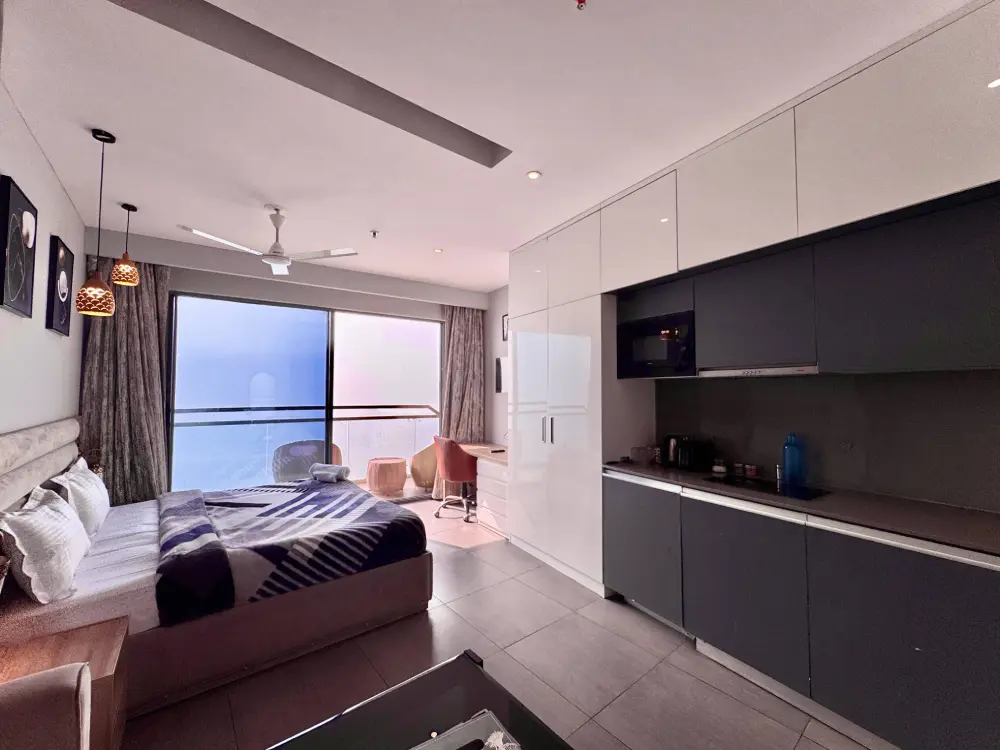 Kitchen area inside luxury stay at Mulberry Homes Supernova Noida