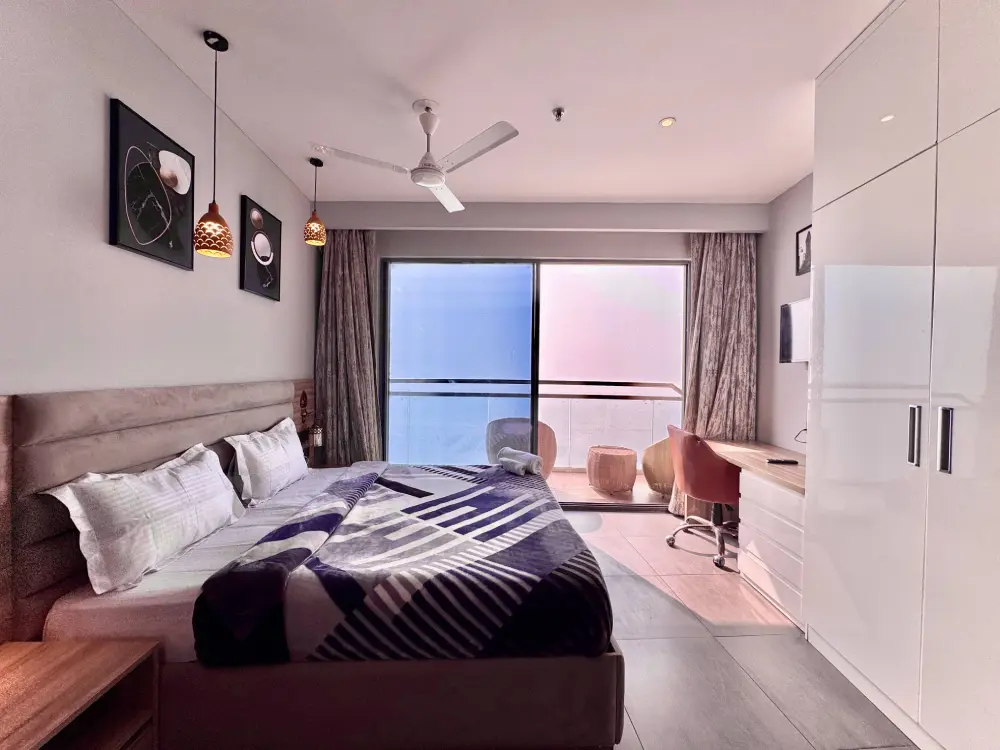 Room with Yamuna river view at Mulberry Homes Supernova Noida