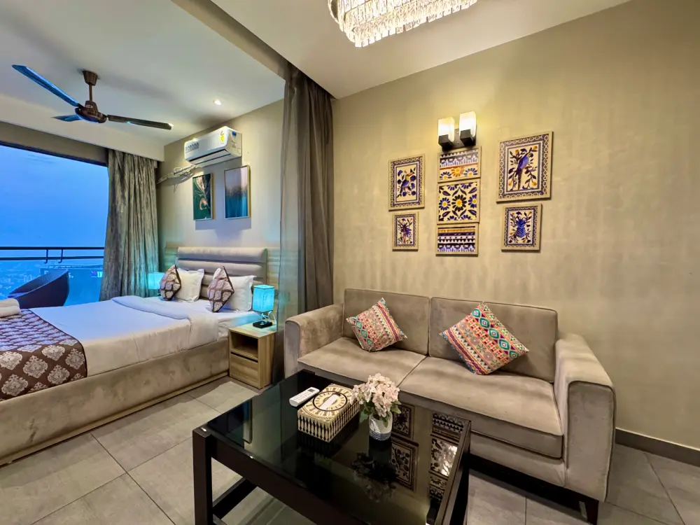 Living room with sofa seating at Mulberry Homes Supernova Noida