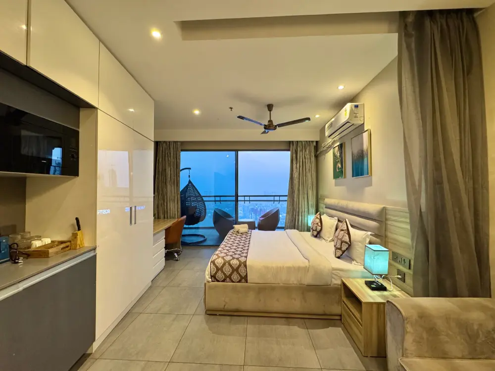 Spacious bedroom with large window at Mulberry Homes Supernova Spira Noida