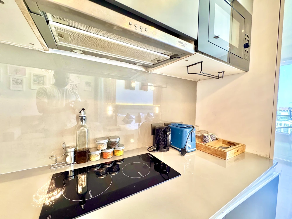 Supernova 94 Noida cozy bedroom with city skyline – Skyline Stay Airbnb
