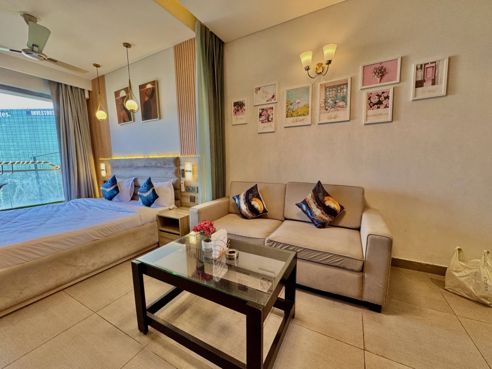 Suprnova Noida modern bedroom decor – Skyline Stay city night view apartment