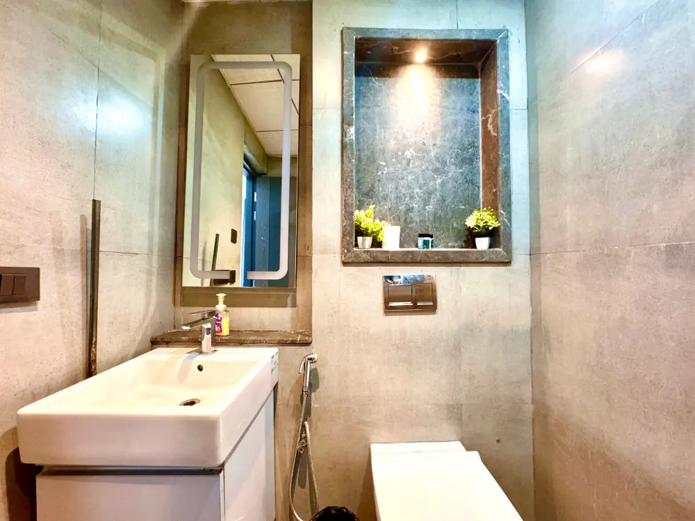 Modern bathroom interior in UrbanAura 37 Supernova Noida apartment